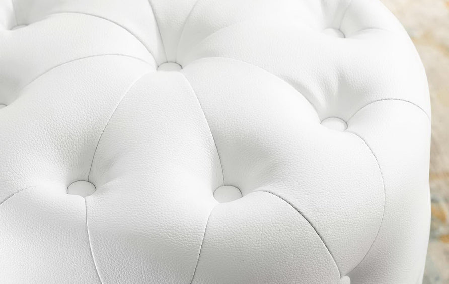 Alder Tufted Button Round Faux Leather Ottoman in White