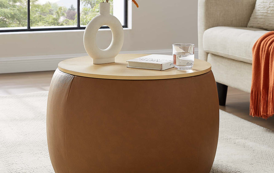 Wynn Round Vegan Leather Storage Ottoman in Tan