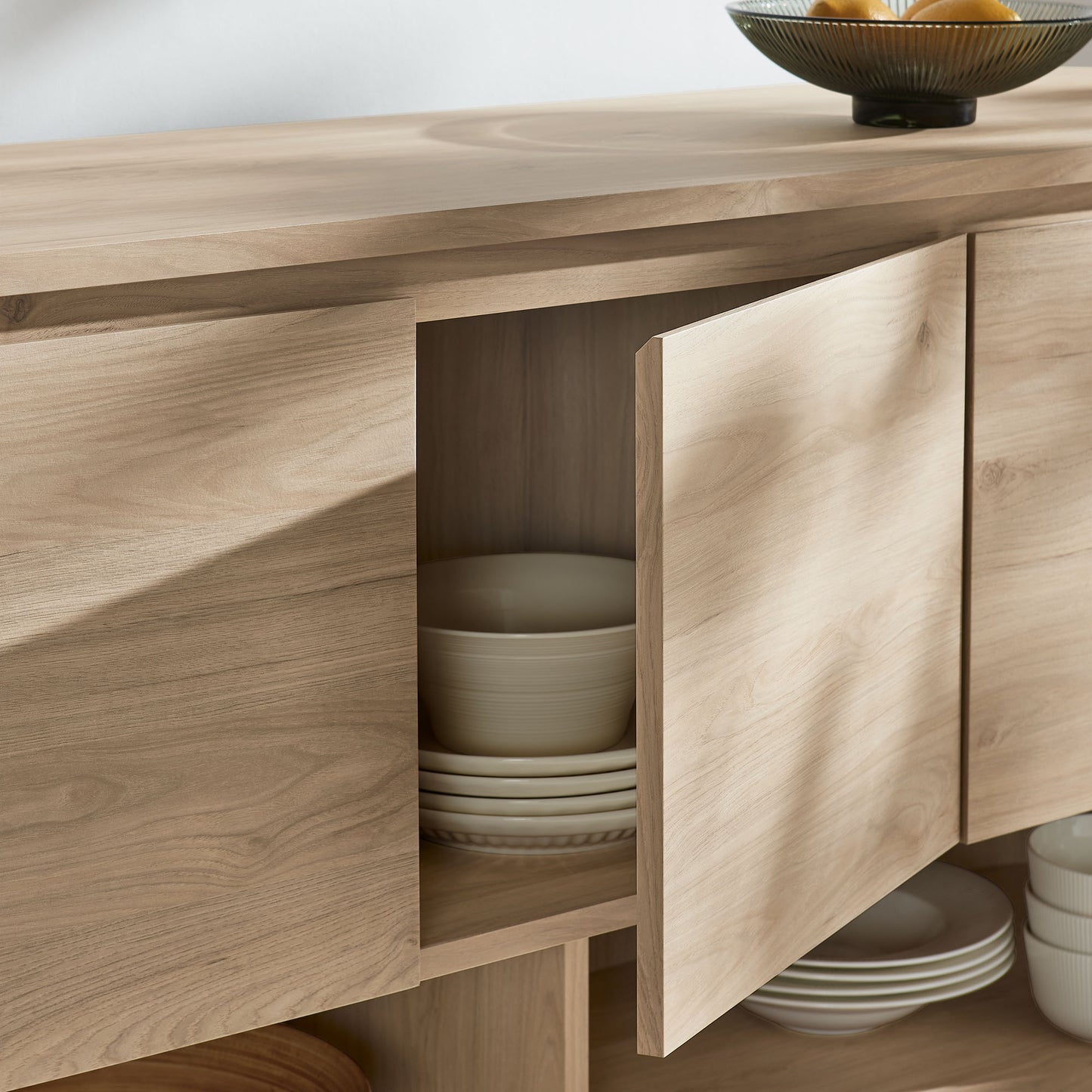 Laurel 62 Inch Oval Sideboard in Light Oak