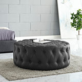 Alder Upholstered Vinyl Ottoman in Black