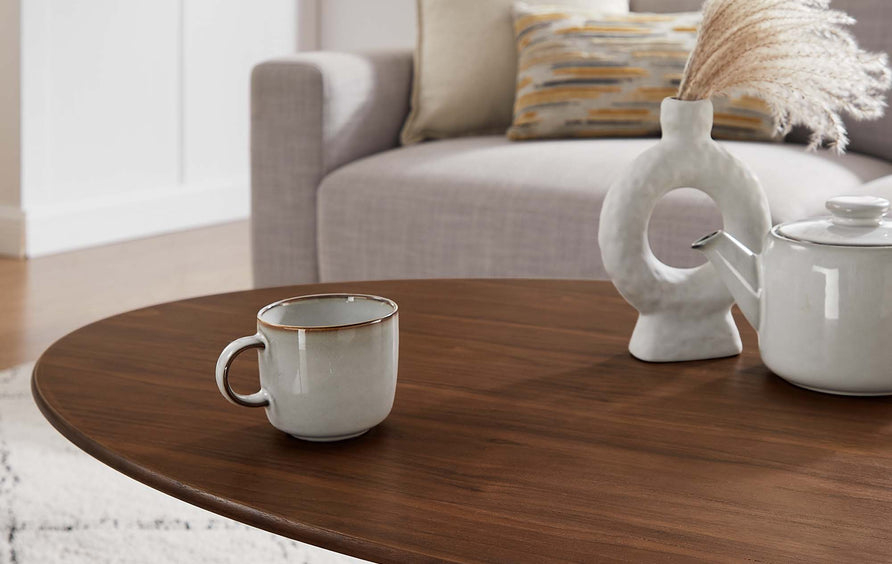 Lumen 48" Oval Wood Coffee Table in Black Walnut