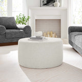 Oren Large 29" Round Woven Heathered Fabric Upholstered Ottoman in Heathered Weave Ivory