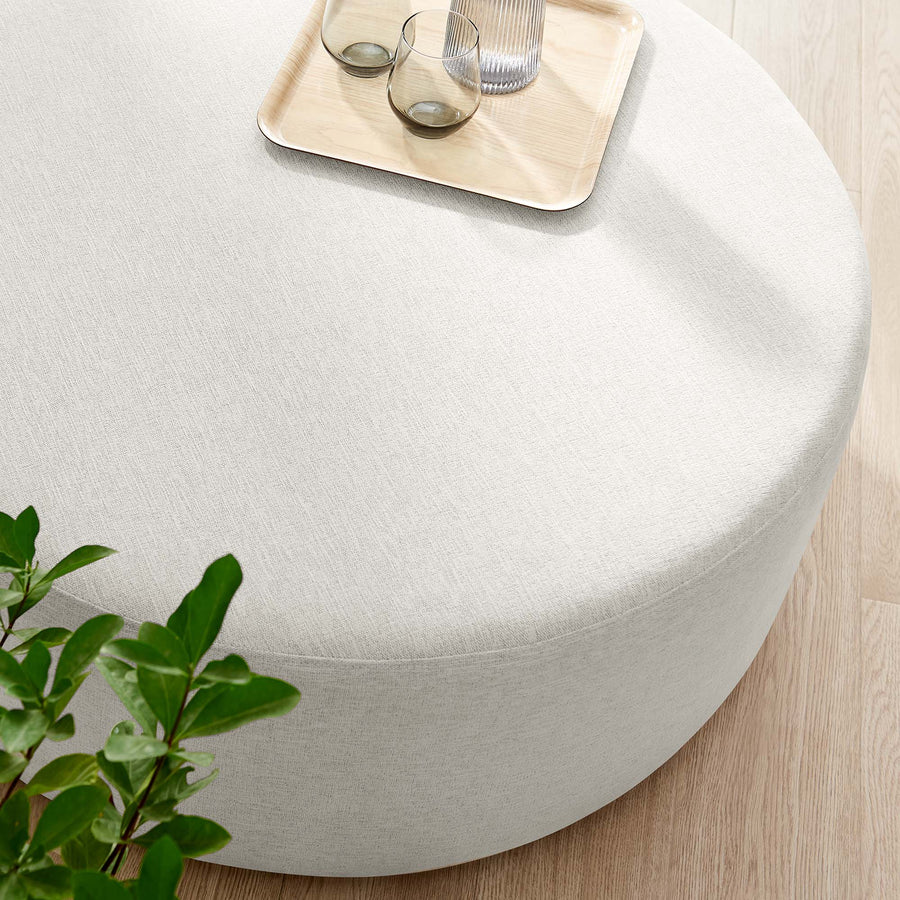 Oren Large 38" Round Woven Heathered Fabric Upholstered Ottoman in Heathered Weave Ivory