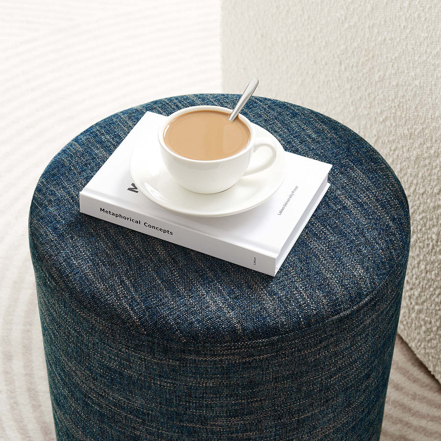 Oren 16" Round Woven Heathered Fabric Upholstered Ottoman in Heathered Weave Azure