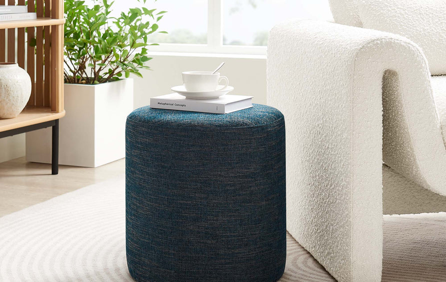 Oren 16" Round Woven Heathered Fabric Upholstered Ottoman in Heathered Weave Azure