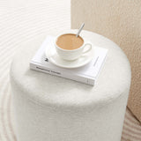 Oren 16" Round Woven Heathered Fabric Upholstered Ottoman in Heathered Weave Ivory