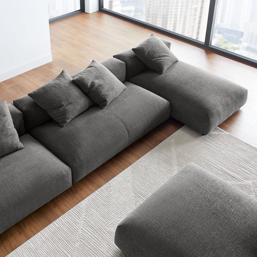 Reed 4-Piece Modular Upholstered Fabric Sectional Sofa With Ottoman in Charcoal