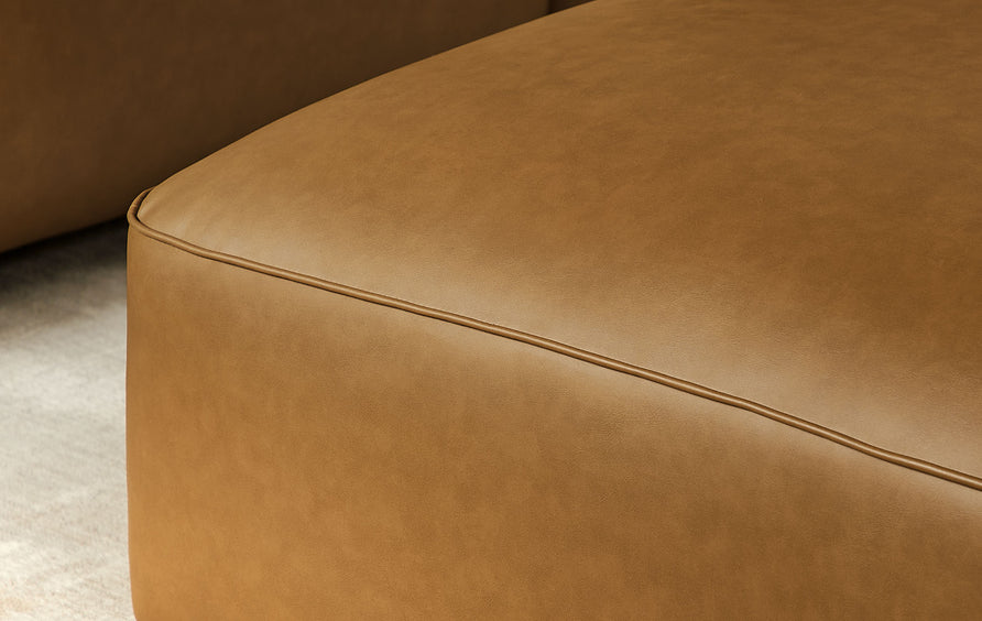 Dune Upholstered Vegan Leather Ottoman in Camel