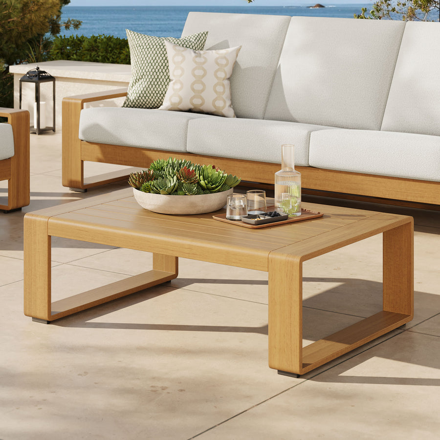 Bramble Outdoor Patio Aluminum Faux Wood Coffee Table in Natural