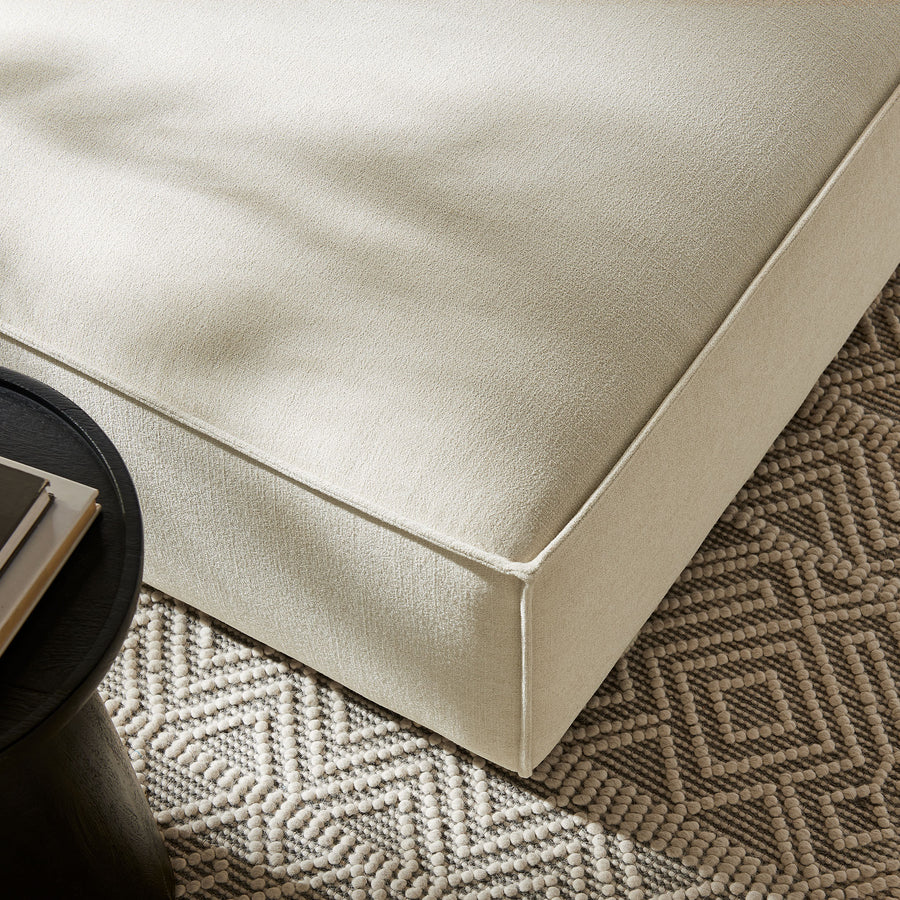 Atlas Performance Fabric Upholstered Modular Ottoman in Ecru