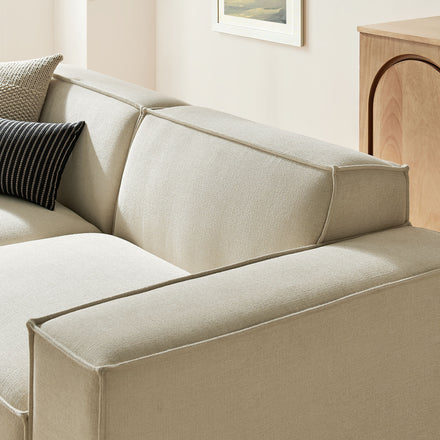Restore 3-Piece Performance Fabric Upholstered Modular Loveseat with Ottoman in Ecru