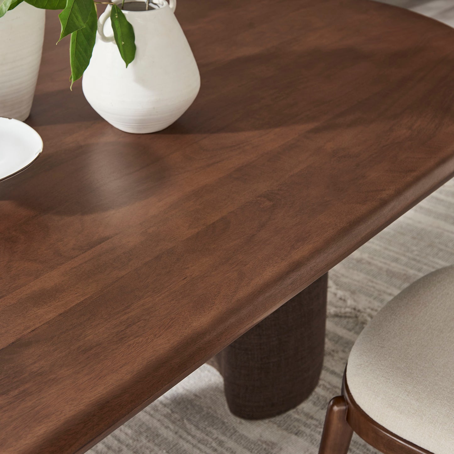 Quenby 84 Inch Mango Wood Oval Dining Table in Walnut