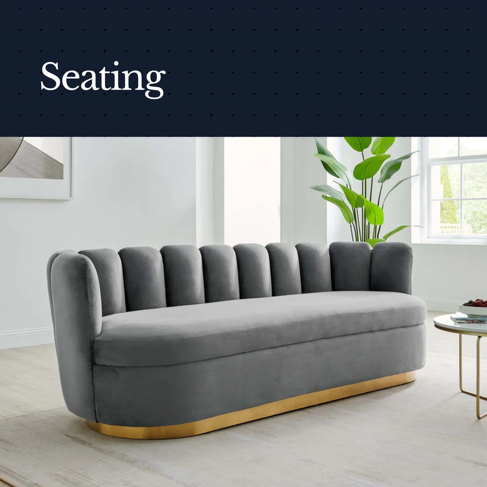 Gray sofa with gold base in a modern living room setting